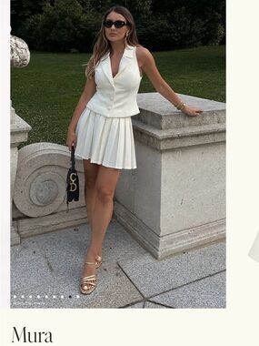 Meshki Cream Button-Front Sleeveless Blazer Top